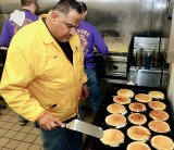 Lemoore Lions Club members, including Bob Casas, served up a hearty meal of eggs, ham, and pancakes.